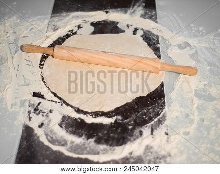 Pizza Dough, Flour And Rolling Pin On The Table