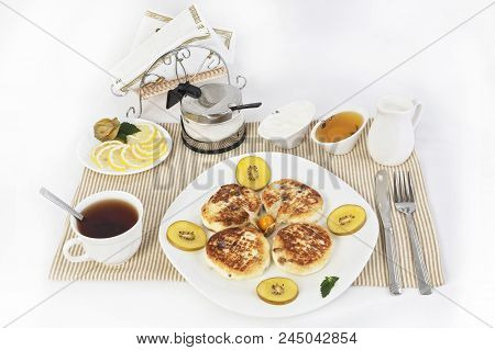 Сurd Pancakes To Tea With Honey And Sour Cream. This Is A Good Treat For Tea With Lemons. A Good And