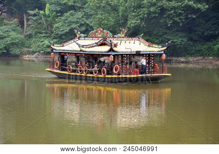 Mount Qingcheng, Sichuan, China - Jun. 21, 2012: Antique Tourism Boat On Yuecheng Lake In Mount Qing