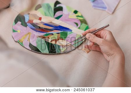 Workplace Of The Mosaic Master: Women's Hands Holding Tool For Mosaic Details In The Process Of Maki