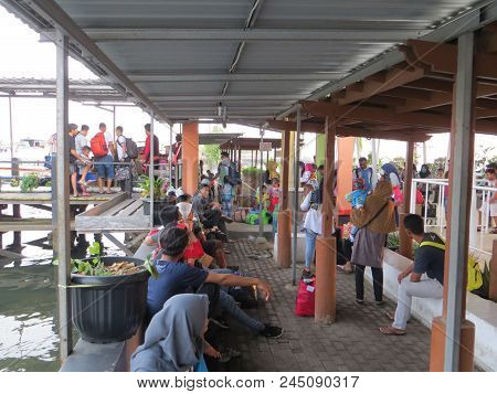 Jakarta, Indonesia - June 11, 2018: A Crowd Of People Waiting For The Departure Of The Ship To Go Ho