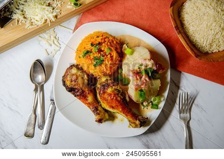 Colombian Cuisine Papas Chorreadas Roasted Chicken Legs And
