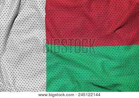 Madagascar Flag Printed On A Polyester Nylon Sportswear Mesh Fabric With Some Folds