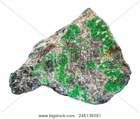 Macro Shooting Of Natural Mineral - Green Uvarovite Crystals On Raw Chromite Stone Isolated On White