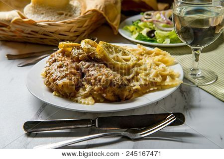 Italian American Chicken Francese With Farfalle Pasta And Side Salad