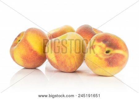 Five Ripe Yellow Peaches Isolated On White Background