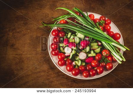 Vegetables For A Picnic, Tomatoes, Cucumbers, Radish, Green Onion On Wooden Background, Top View, Fi