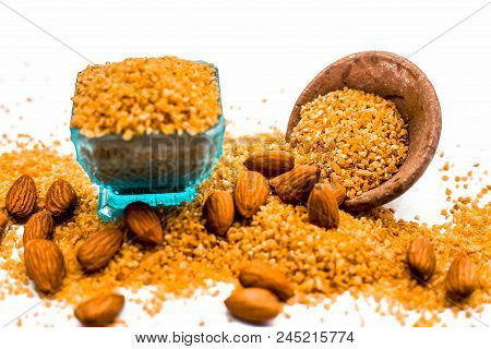 Close Up Of Raw Uncooked Dalia Or Bulgur Or Mixed Cereals Or Oats With Dry Fruits Ingredients For Da