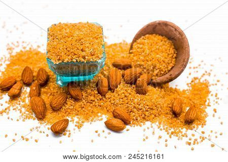 Close Up Of Raw Uncooked Dalia Or Bulgur Or Mixed Cereals Or Oats With Dry Fruits Ingredients For Da