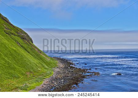 Kuril, Simushir Island. High breakage shore before the Pacific ocean.