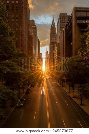 Sun Setting Along The Length Of 42nd Street In New York City Known As Manhattanhenge