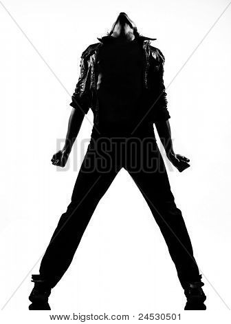 full length silhouet van een jonge man danser dansen funky hip hop r&b op geïsoleerde studio witte ba