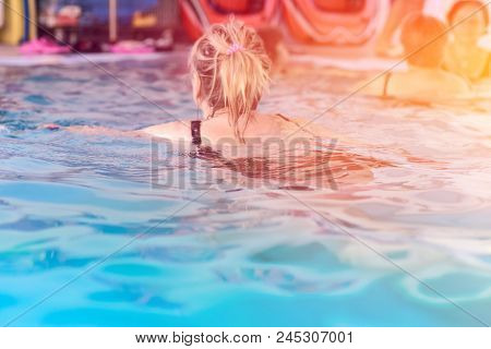 Group Or Young And Senior People In Aquarobic Fitness Swimming Pool Exercising Water Sport