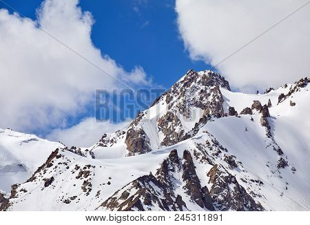 Snowy Peak In The Mountains