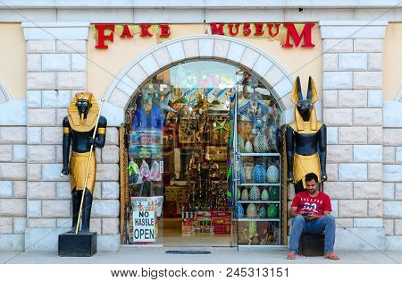 Sharm El Sheikh, Egypt - May 12, 2018: Unknown Man Is Located At Entrance To Store In Business And S