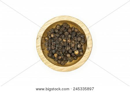 Drupes Of Fresh Black Pepper In A Wooden Bowl Top View Isolated On White Background