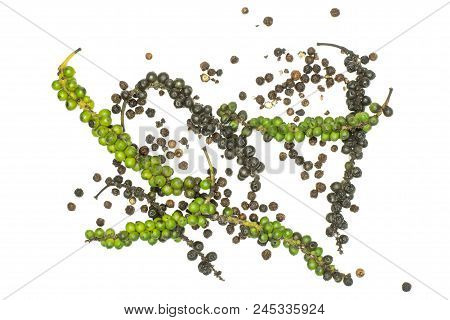 Unripe Drupes And Fresh Black Pepper Grains Top View Isolated On White Background