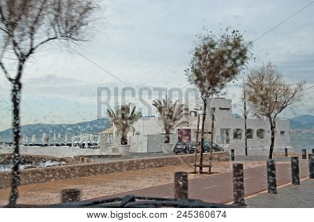 Palma De Mallorca, Spain - November 15, 2011: Puro Beach Seen Through Raindrops On Car Window In Pal