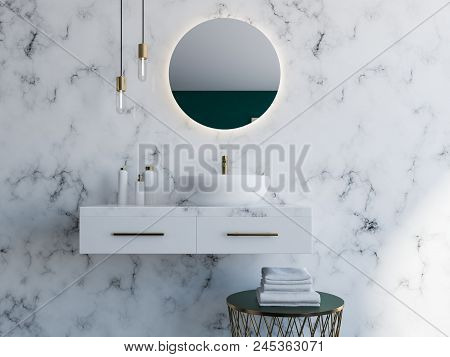 Elegant White Sink Standing On A White Shelf. A Round Mirror Is Hanging Above It. White Marble Bathr