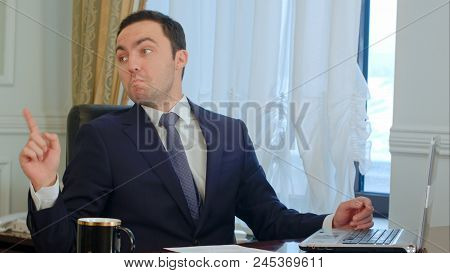 Angry Businessman Talk, Waving His Hands. Professional Shot In 4k