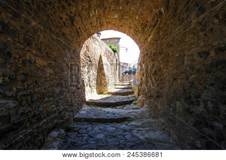 Arka Petrarka, Italy - June, 13, 2018: small street in an old town in Arka Petrarka, Italy
