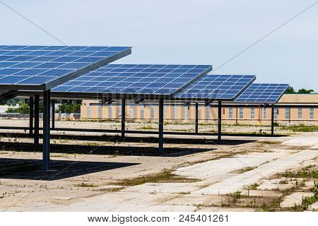 Solar Thermal Flat Panels Providing Shade In A Patking Lot. Many Companies Are Installing Renewable 