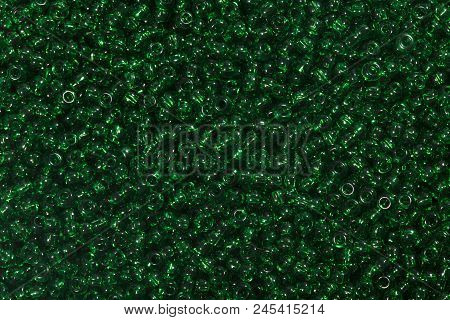 Close Up Of Gark Green Seed Beads