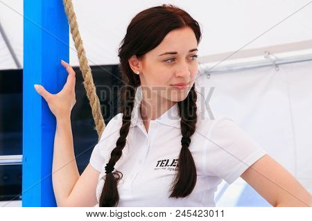 Zelenogradsk, Kaliningrad Region, Russia - July 29, 2017: Unknown Young Woman In A Branded Shirt Of 