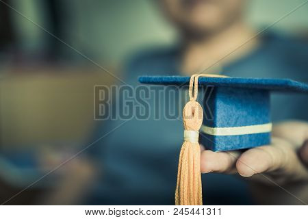 Graduation Cap On Hands Show Success In Education Learning Study International Abroad 
With Blur Stu