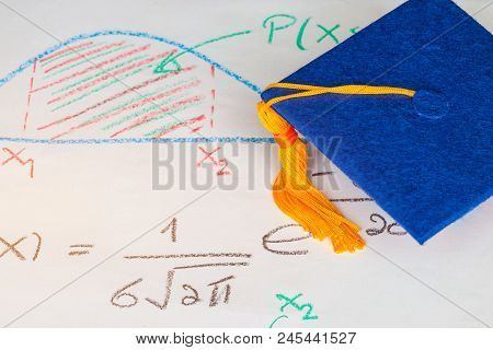 Graduation Cap On Paper Math Formula Equation Graph On Screen Classroom. Ideas For Abroad Internatio