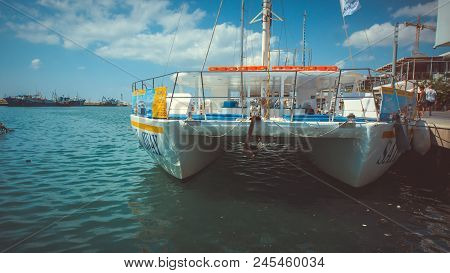 The Old Fishing Boats Are Waving On The Waves. Shipyard  In Limassol, Cyprus,  August 2017