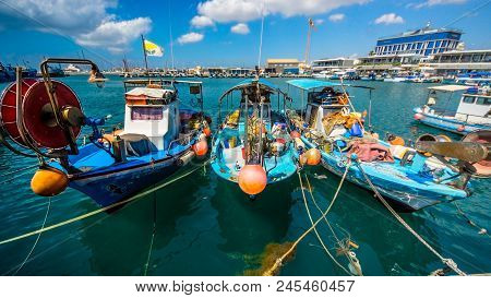 The Old Fishing Boats Are Waving On The Waves. Shipyard  In Limassol, Cyprus,  August 2017