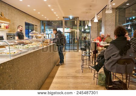 MILAN, ITALY - CIRCA NOVEMBER, 2017: interior shot of Farini in Milan. Farini is modern bakery which offers Italian pastry, salads, bowls and pizza