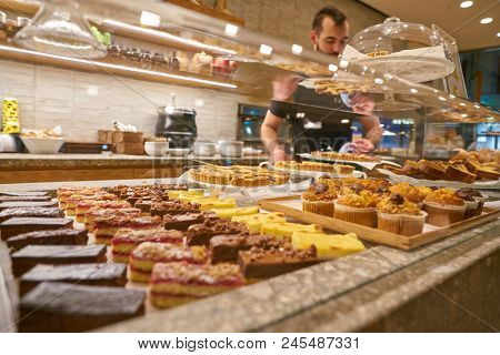 MILAN, ITALY - CIRCA NOVEMBER, 2017: desserts on displya at Farini in Milan. Farini is modern bakery which offers Italian pastry, salads, bowls and pizza