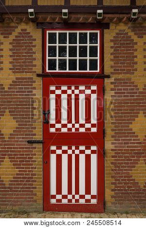 Red And White Decorated Doors Of The Stables Of De Haar Castle. The Red And White Are The Colors Of 