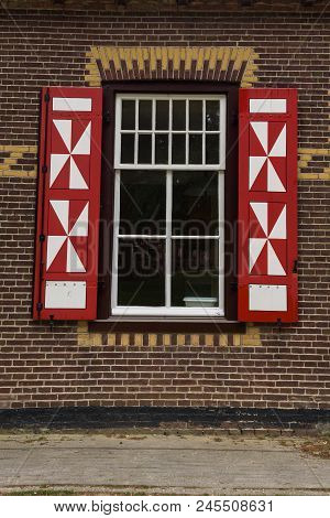 Red And White Decorations On The Doors And Window Shutters Of De Haar Castle. The Colors Are Derived