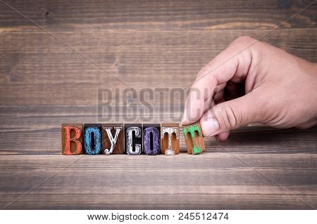 Boycott, Communication And Business Concept. Wooden Letters On The Office Desk, Informative And Comm