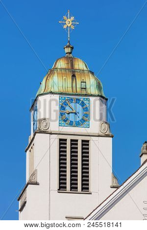 Tower Of The St. Agatha Church In The Town Of Dietikon In The Swiss Canton Of Zurich.