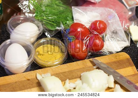 Fresh Products Prepacked For Salad. Tomatoes, Sour Cream, Arugula.
