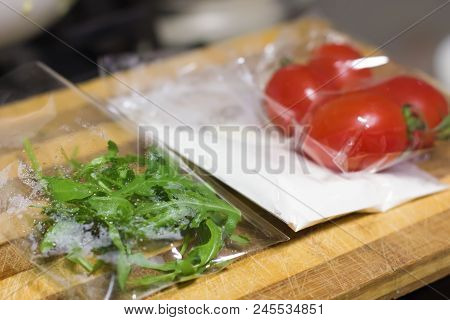 Fresh Products Prepacked For Salad. Tomatoes, Sour Cream, Arugula.