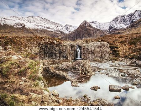 Multiple Waterfalls, Seemingly Vibrant Blue And  Green In Color, With Cold Swimmable Pools. Popolar 