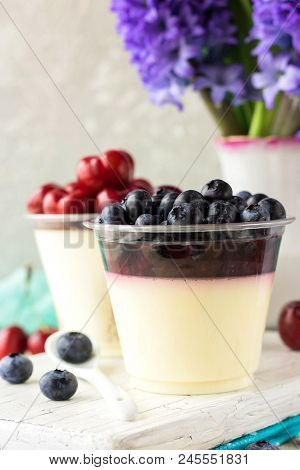 Italian Dessert Pana Cota With Berry Jam And Fresh Blueberries