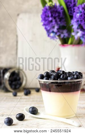 Italian Dessert Pana Cota With Berry Jam And Fresh Blueberries