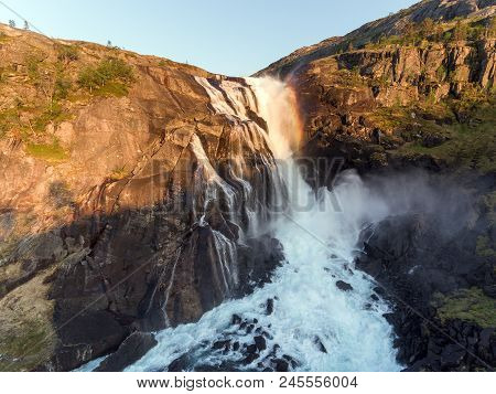 Photo Of Rapid Stunning Waterfall In Husedalen Valley, Norway. Aerial View. Summer Time.