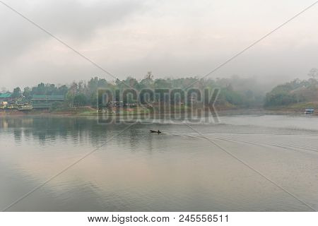 Landscape Of River And Houseboat With Morning Mist