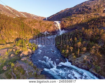 Photo Of Rapid Stunning Waterfall In Husedalen Valley, Norway. Aerial View. Summer Time
