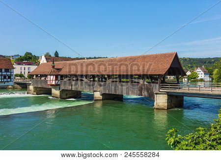 Medieval Bridge Over The Reuss River In The Town Of Bremgarten In Summertime. Bremgarten Is A Munici