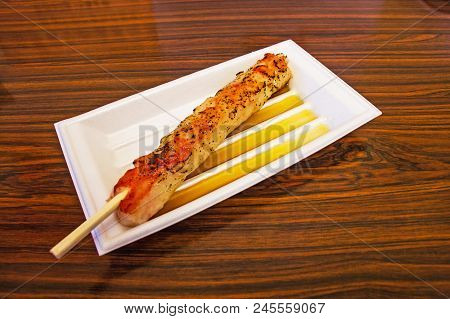 Japanese Style King Crab Meat Chacoal Grilled Put A Thin Foam Tray On A Wooden Table.