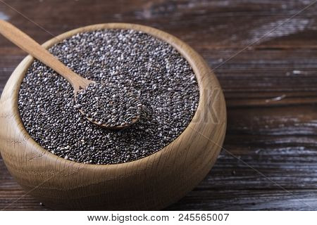 Minimalistic Composition With Chia Seeds On Table. Healthy Nutritious Food.