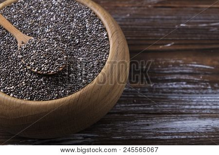 Minimalistic Composition With Chia Seeds On Table. Healthy Nutritious Food.